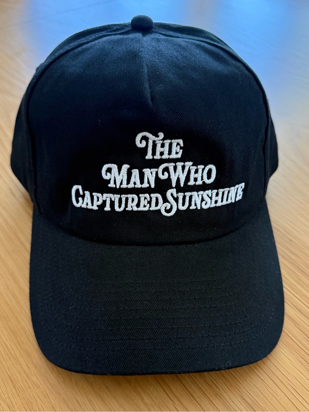 ‘The Man Who Captured Sunshine’ Black Embroidered SnapBack Cap - Picture 2 of 7